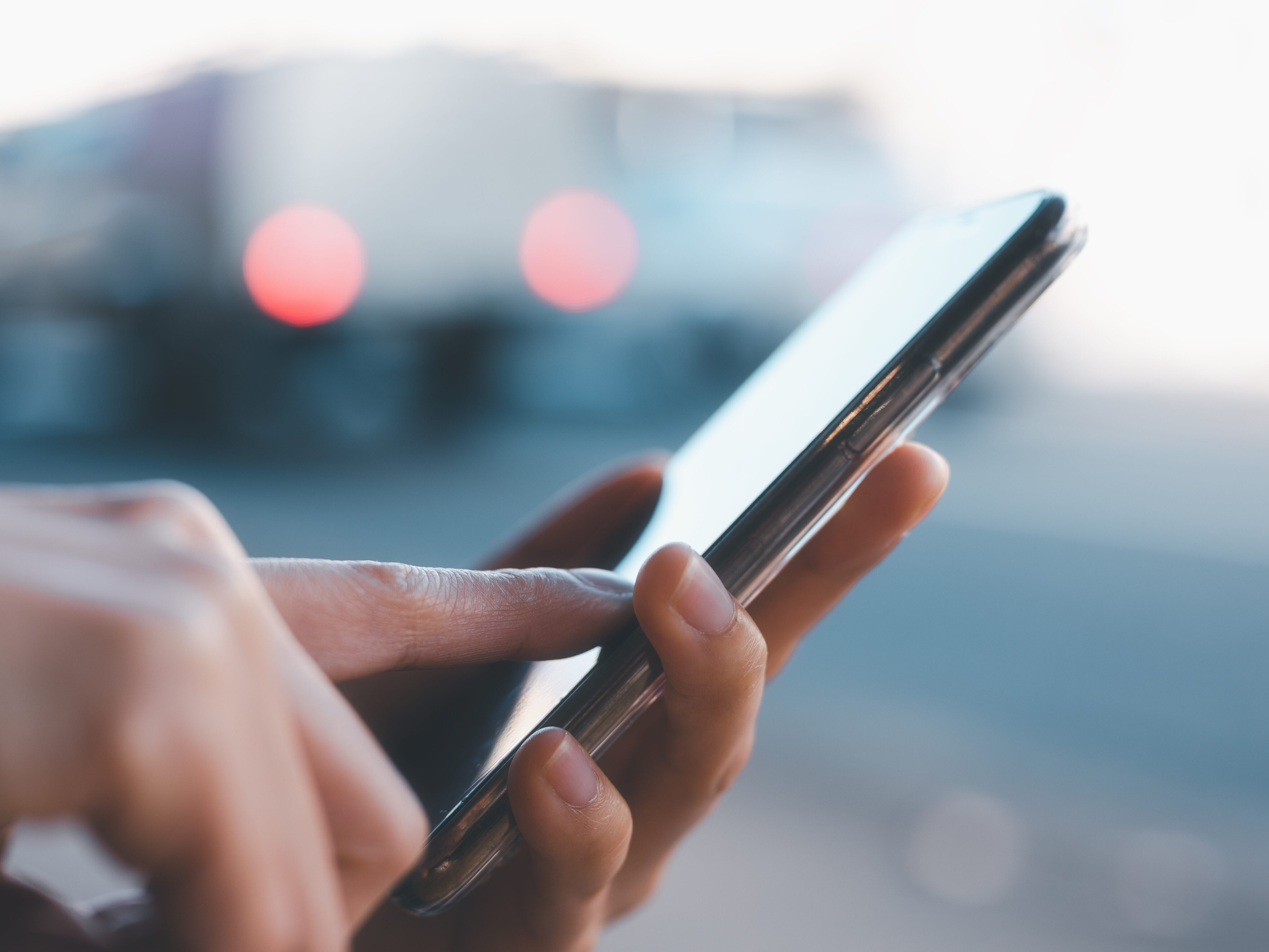 Social media marketing concept. Women hand using smartphone typing, chatting conversation in chat box icons pop up